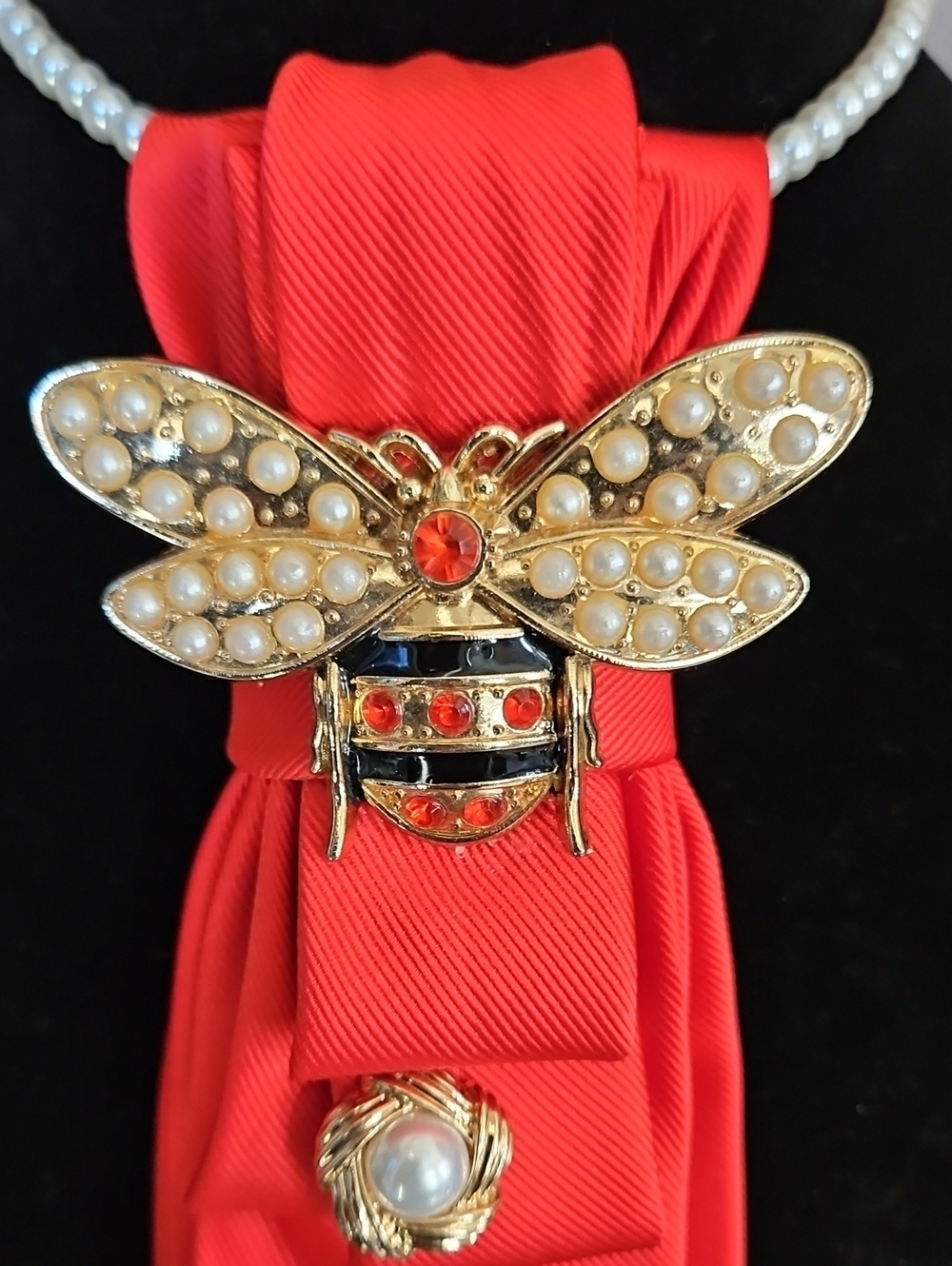 Upcycled Orange Red Necktie Necklace with Gold Bee Brooch and Pearl Accents - Picture 2 of 6